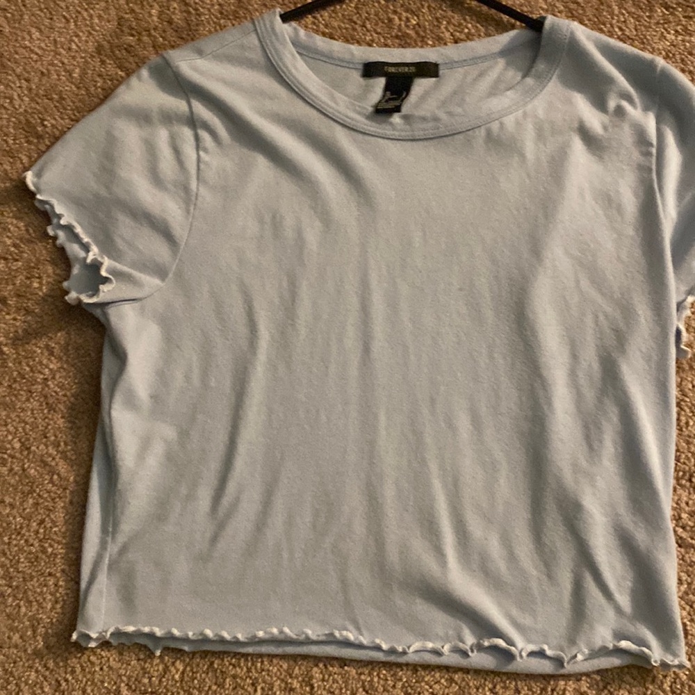 forever 21 light blue shirt with crinkle patterns at the ends
